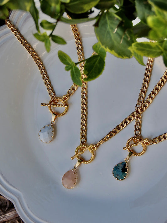 golden crystal toggle necklace